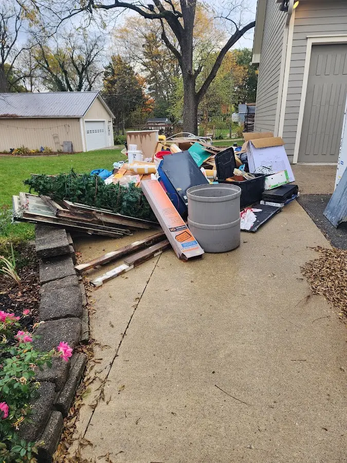 Dumpster being loaded with debris for 3 Yard Dumpster Rental in Attica